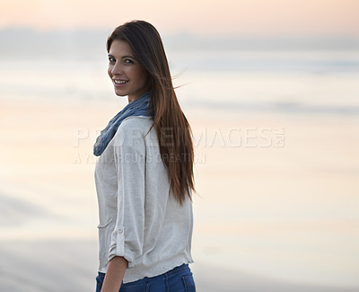 Buy stock photo Woman, walking and smile in portrait at beach, sunset and vacation with nature to relax by ocean. Girl, person and outdoor by sea with walking for holiday, adventure and happy by coast in Australia