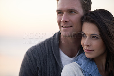 Buy stock photo Couple, thinking and embrace with love outdoor at sunset planning future holiday together in Florida. Travel, ideas and man with woman on beach, vacation or date in summer with support in marriage