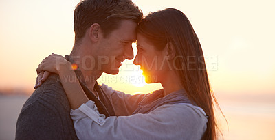 Buy stock photo Couple, forehead touch on beach and sunset, nature and travel with bonding for love and commitment outdoor. People with support, trust and hug with adventure together for honeymoon or anniversary