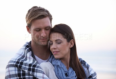 Buy stock photo Couple, love and embrace outdoor with blanket together on holiday in Florida with sky background. Travel, vacation and man hug woman on date in summer with care, support and kindness in marriage