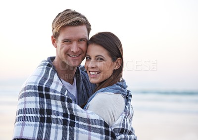 Buy stock photo Couple, hug and portrait on beach at sunset with happiness together on holiday in Florida. Travel, vacation and man embrace woman with blanket outdoor on date with care, support and love in marriage