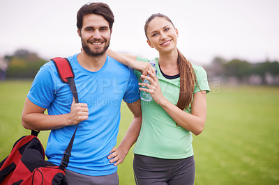 Buy stock photo Fitness, couple in portrait outdoor and workout on field, happy and healthy with partner, physical activity and support. People smile for wellness, exercise together in park and training for bonding
