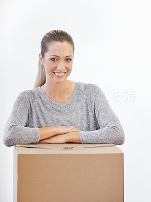 Buy stock photo Portrait, moving and woman with a box, home and model isolated on a white studio background. Face, person and girl with property and real estate with renovation and achievement with package or parcel