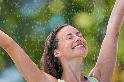 Buy stock photo Stretching, rain and happy with woman, nature and freedom with celebration and excited. Outdoor, person or girl in a park, wet or carefree with excitement or cheerful with a break, victory or winning