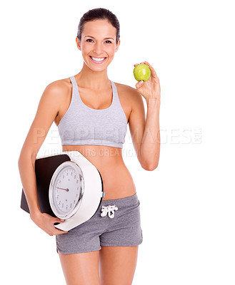 Buy stock photo Fitness, apple and portrait of woman with scale in studio for weight loss, health and wellness diet. Vitamins, nutrition and female person eating organic fruit and measure by white background.