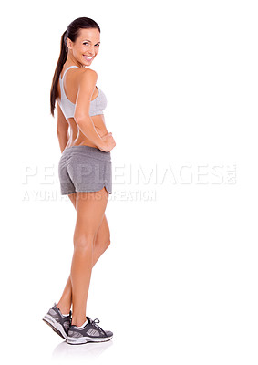 Buy stock photo Portrait of an attractive and sporty young woman against a white background