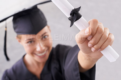 Buy stock photo Graduate, certificate and hand of happy woman in celebration for success at college. Face, graduation and closeup of student with diploma for education, achievement and smile for award in university