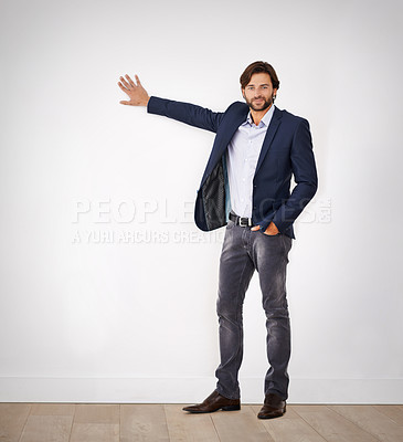 Buy stock photo Portrait, man and showing for presentation with smile, confidence and business attire in studio. Businessman, professional designer and advice for client, meeting and consultation on white background