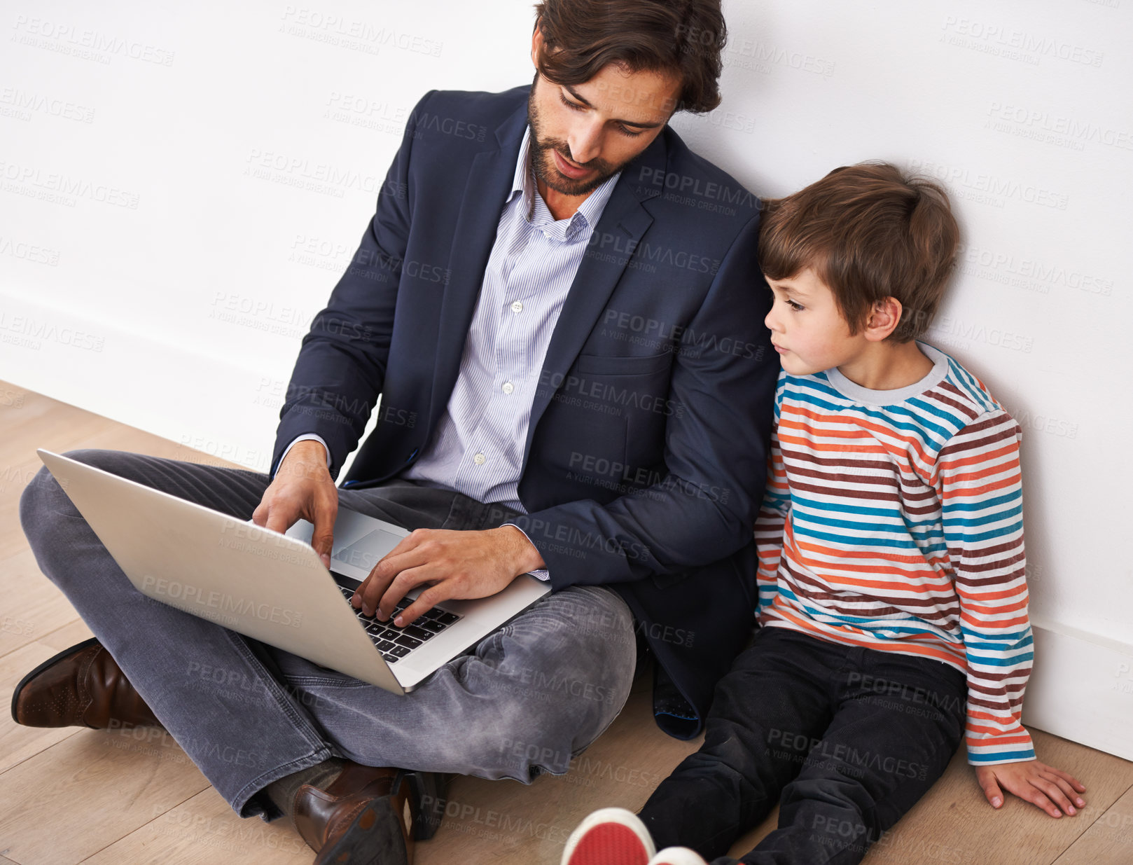 Buy stock photo Father, son and bonding on floor with laptop for remote work with video streaming, online games and movies in home. Family, parent and child with technology on ground for relax, communication and fun