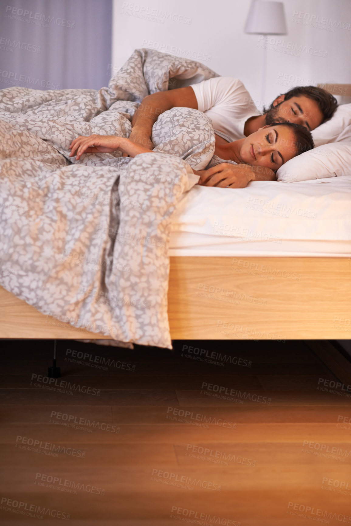 Buy stock photo A couple sleeping in their bed