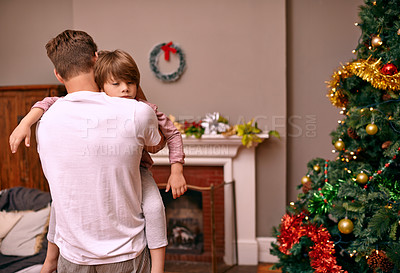 Buy stock photo Father, son and embrace with comfort on christmas for celebration, sleeping and love in the morning. Family, man and child with hug, relax and enjoying holiday season in living room or lounge of home