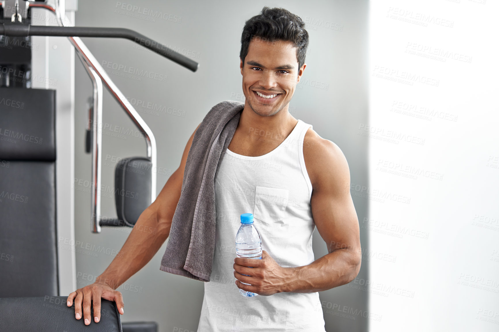 Buy stock photo Fitness, portrait and happy man with water at gym for weightlifting, training or wellness, exercise or cardio. Face, smile and male bodybuilder with sports drink for workout, recovery or hydration