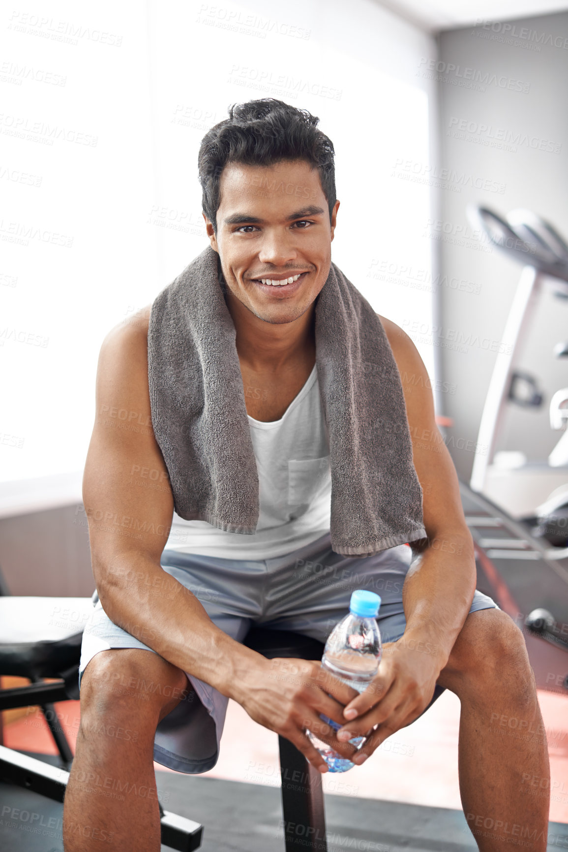 Buy stock photo Happy, man and portrait at gym with water bottle for recovery after exercise and body building. Healthy, fitness or person relax after workout with liquid hydration for benefits to wellness in Mexico