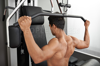 Buy stock photo Fitness, shoulder press and back of man in studio on gray background for training or workout at gym. Exercise, health or pull down machine and body builder with equipment for wellness or strength