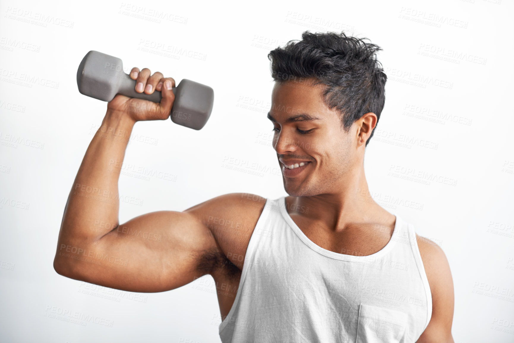 Buy stock photo Gym, fitness and happy man with dumbbell in studio for weightlifting, sports or resilience on white background. Training, face or male bodybuilder with space for power, performance or bicep challenge