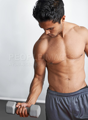 Buy stock photo A fitness shot of an athletic young man
