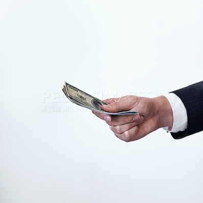 Buy stock photo Business person, hands and money with payment or bribe for agreement or deal on a white studio background. Closeup of employee with cash, dollar bills or paper for secret, bribery or fraud on mockup