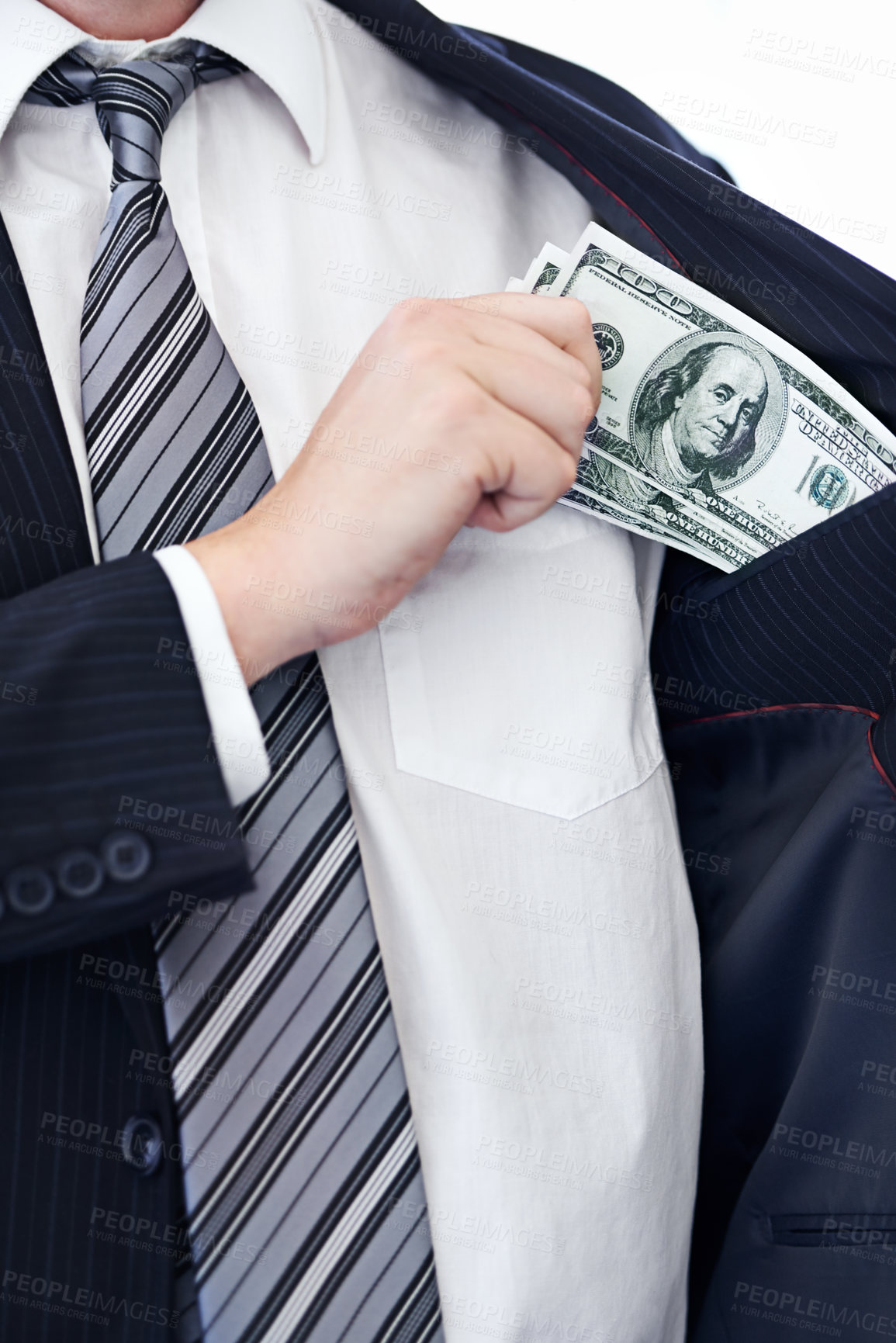 Buy stock photo Business person, hands and money bribe in pocket for fraud, scam or secret on a white studio background. Closeup of employee with cash, dollar bills or finance in bribery, deal or financial exchange