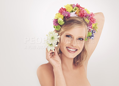 Buy stock photo Woman, portrait and flowers on crown in studio with makeup and happy for cosmetics, beauty or skincare. Spring aesthetic, model and face or floral headband with mockup or wellness on white background