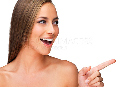 Buy stock photo Wow, skincare and happy woman with hand pointing in studio for beauty, info or promotion on white background. Cosmetic, surprise or female model show glowing skin, shine or dermatology, deal or offer
