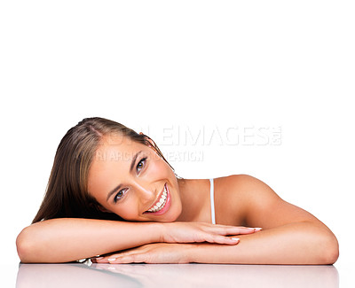 Buy stock photo Portrait, smile and skincare of woman on table for wellness or health isolated on a white studio background mockup. Face, cosmetics and happy model on desk for spa facial treatment, beauty and makeup
