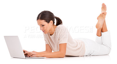Buy stock photo Woman, laptop and typing in studio for online communication as journalist for research project, networking or internet. Female person, white background and mockup or teach writing, email or browsing