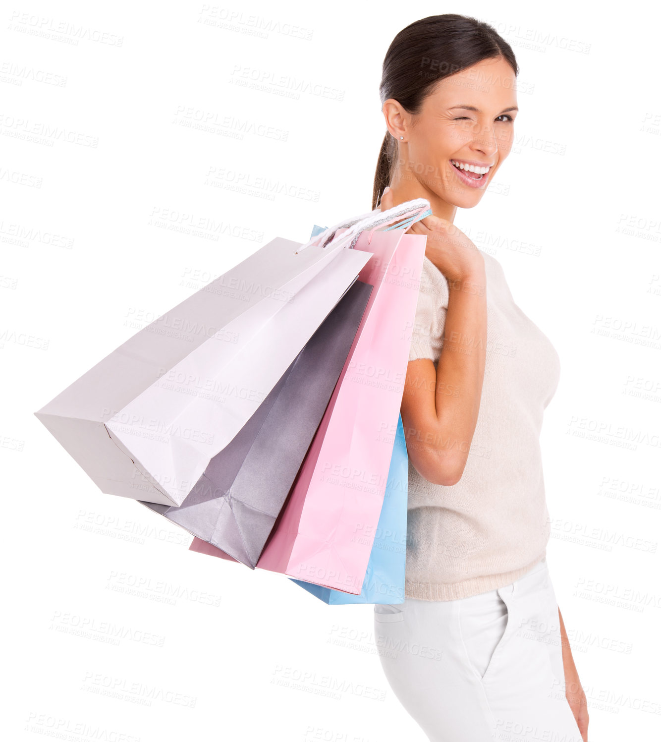Buy stock photo Wink, shopping and portrait of woman on a white background with bag for sale, discount and deal. Excited, happy customer and isolated person for retail, consumerism and fashion purchase in studio