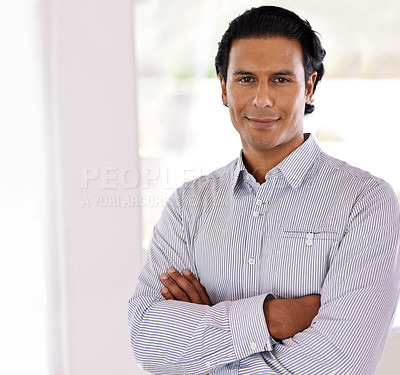 Buy stock photo Confidence, smile and portrait of Indian businessman, entrepreneur or manager in office. Director, small business owner and face of happy man with arms crossed in professional workplace with pride.