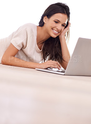 Buy stock photo Face, relax and laptop with woman on floor of living room in home for email, internet or research. Computer, smile and social media with happy young person in apartment for website browsing
