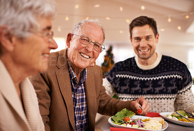 Buy stock photo Grandfather, portrait and family at dinner on Christmas together with food and celebration in home. Happy, event and old man smile with plate at lunch and relax on holiday at table with people