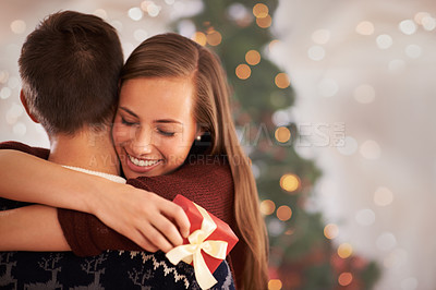 Buy stock photo Home, hug and couple with love, Christmas and festive season with marriage and holiday. Apartment, embrace or man with woman or vacation with Xmas or celebration with relationship or bonding together