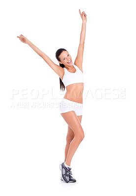 Buy stock photo Full length studio shot of a fit young woman in exercise clothing raising her arms in celebration isolated on white