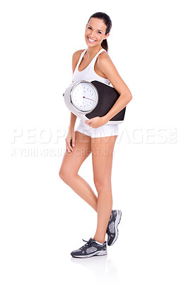 Buy stock photo Studio portrait of a fit young woman carrying a scale isolated on white