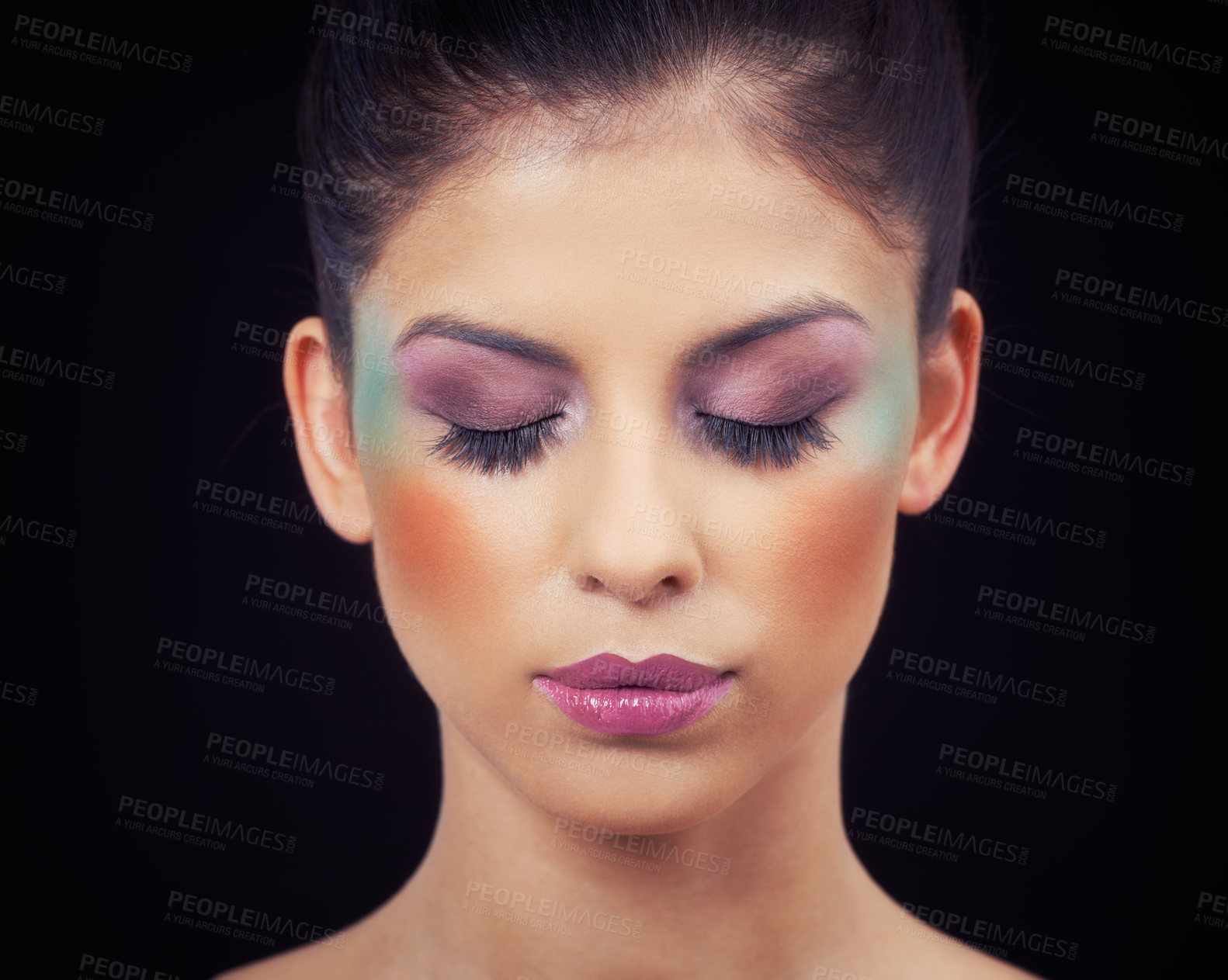 Buy stock photo Cropped shot of a beautiful young woman wearing colorful makeup