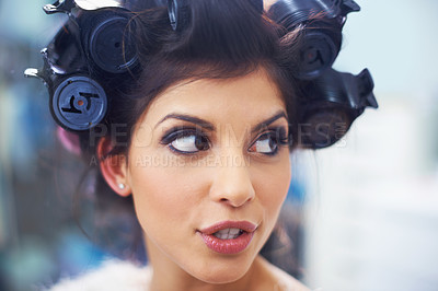 Buy stock photo Woman, face and hair curlers with makeup for beauty in salon with haircare, self care or cosmetology. Model, person or hairstyle for morning routine, curling or getting ready for wellness or grooming