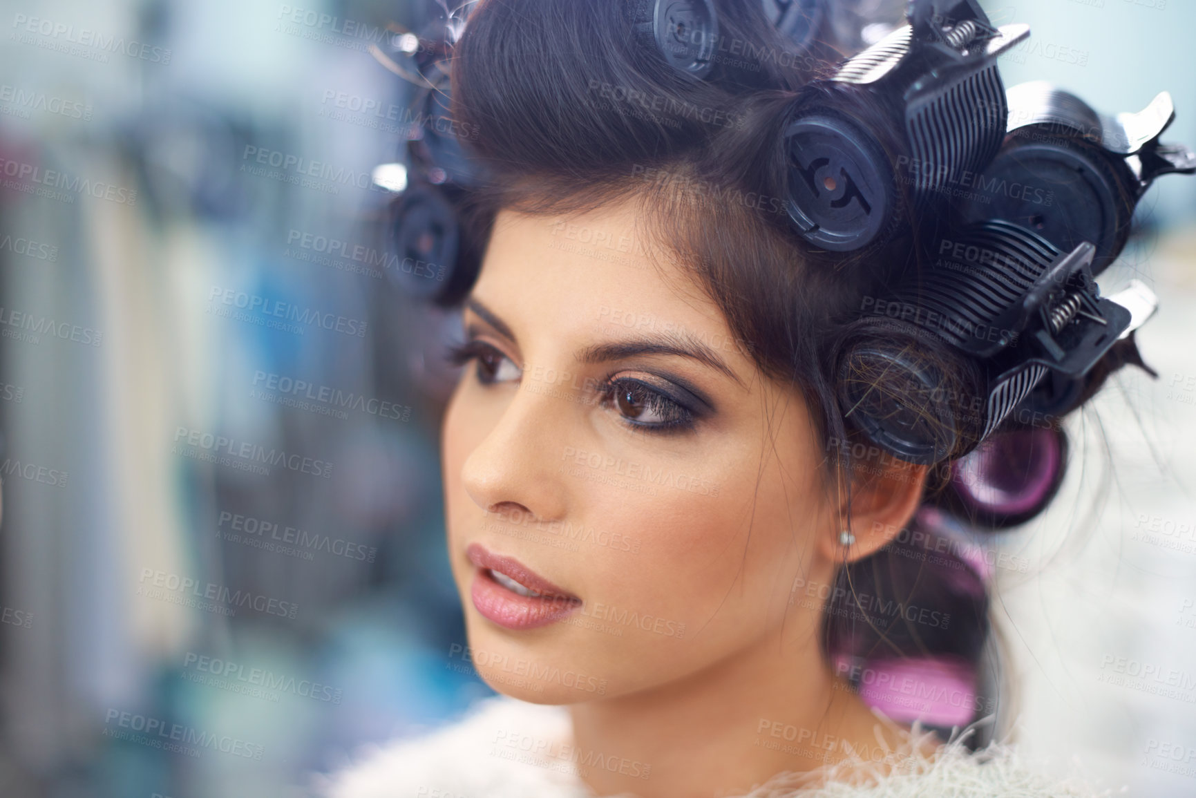 Buy stock photo Woman face, hair and makeup with curlers in salon, cosmetic care and fashion model for treatment. Beauty, actor or celebrity backstage with hairdresser and styling, haircare with skin and glamour