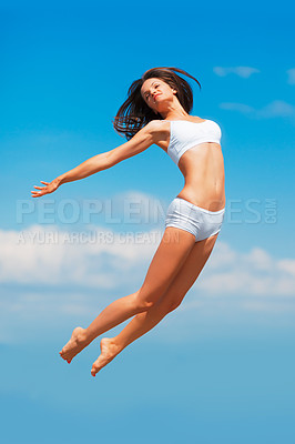 Buy stock photo Sky background, jumping and woman body in underwear with fitness energy, freedom and health goals. Mock up, clouds and sports model with jump, sunshine and healthy mindset for performance in air.