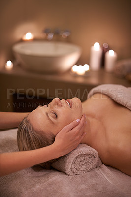 Buy stock photo Face massage, spa and relax with woman, beauty and candles with hospitality and stress relief. Person, facial and girl with wellness or healthy with vacation or peace with holiday, detox or self care