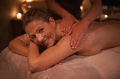 Buy stock photo Woman, masseuse and portrait for wellness, relax and self care and back massage on table with smile. Female person, spa day and pampering to destress, peace and detox for calm lifestyle and happy  