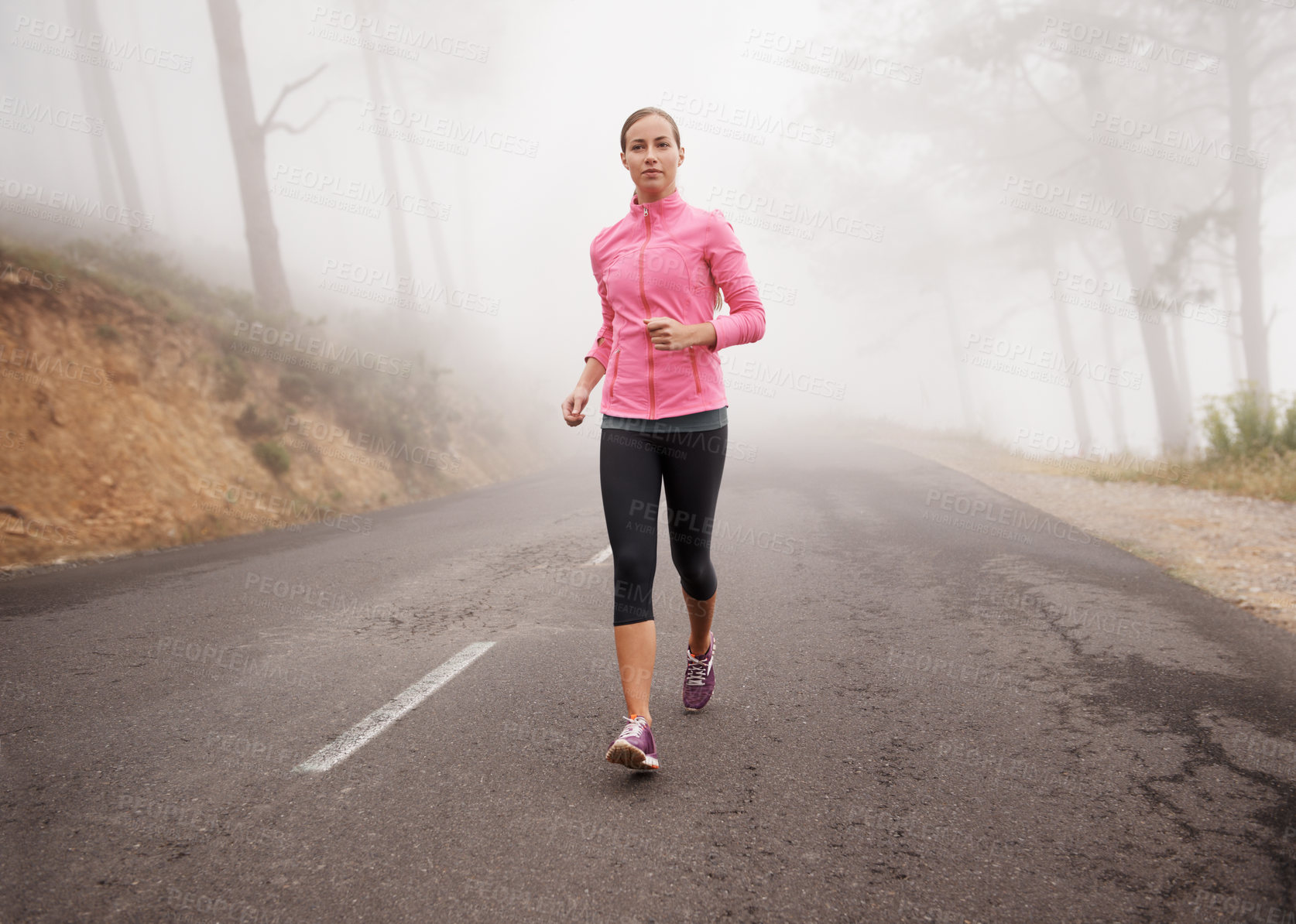 Buy stock photo Nature, sports and woman running in fog on mountain road for race, marathon or competition training. Fitness, exercise and female athlete with cardio workout in misty outdoor woods or forest.