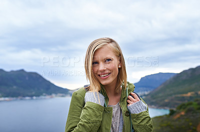 Buy stock photo Woman, hiking and mountains for outdoor travel with wellness, fitness and location in Finland for eco friendly tourism. Young person with backpack for trekking, journey and thinking of her adventure