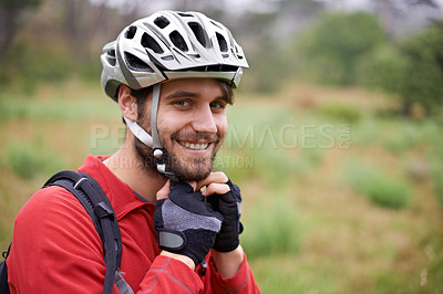 Buy stock photo Cycling, happy man and portrait in helmet for safety, protection and gear to travel outdoor in Canada. Bicyclist, face and person with hat getting ready for training, sports and fitness in nature