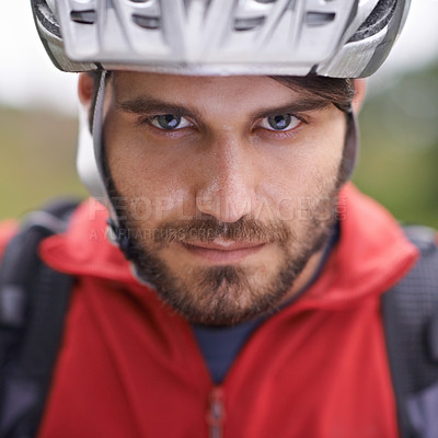 Buy stock photo Closeup portrait of a cyclist wearing a helmet
