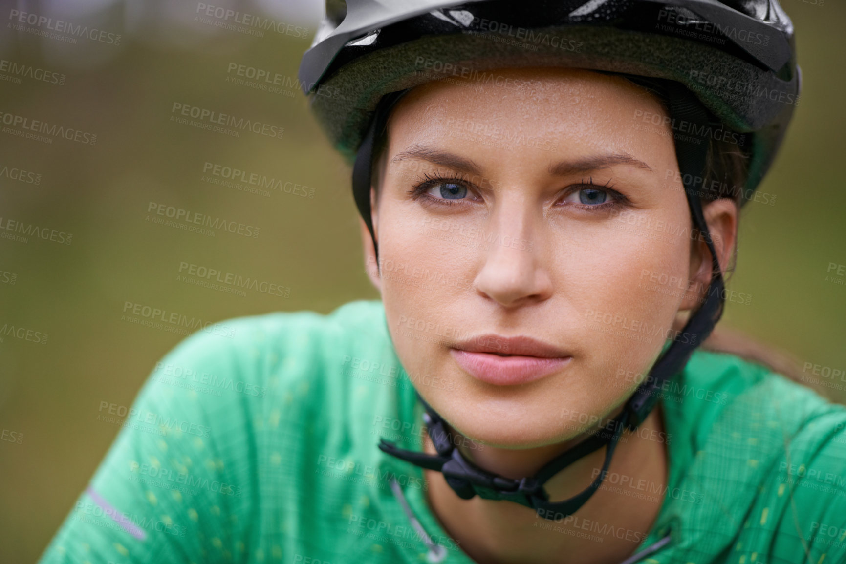 Buy stock photo Portrait, cycling and helmet with woman closeup in nature for fitness, training or off road hobby. Face, exercise and health with confident young athlete or cyclist outdoor in countryside for cardio