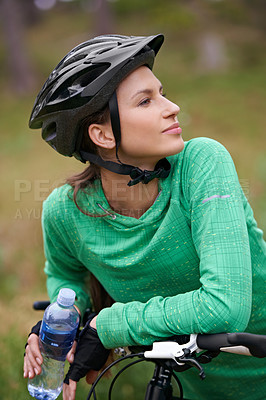 Buy stock photo Thinking, bicycle and woman in nature to exercise with water bottle outdoor for hydration. Bicyclist, cycling and female person on bike to travel on journey, adventure or workout for sports in summer
