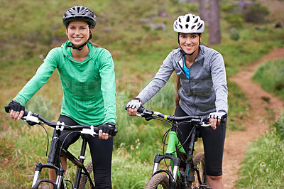 Buy stock photo Happy woman, portrait and friends on bicycle for sports, fitness or outdoor cycling in nature. Young female person, athlete or cyclist in forest for off road workout, training or cardio exercise