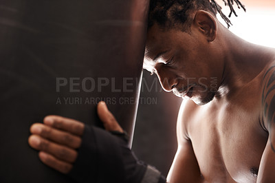 Buy stock photo Boxing, fatigue and black man with punching bag in gym for challenge, fight and competition training. Power, muscle and exhausted champion boxer at workout with tired face, thinking and sports club.