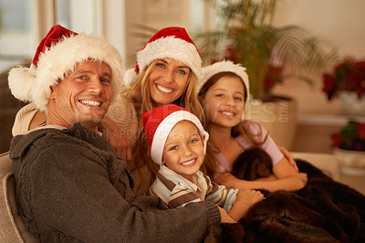 Buy stock photo Christmas, relax and portrait of family on sofa for celebration, holiday and festive season. Happy, smile and gratitude with parents and children in living room at home for xmas, content and lounge