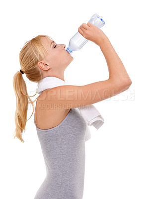Buy stock photo Studio shot of a young woman working out isolated on shite