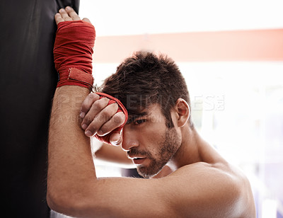 Buy stock photo Portrait of a muscular young boxing standing in a gym